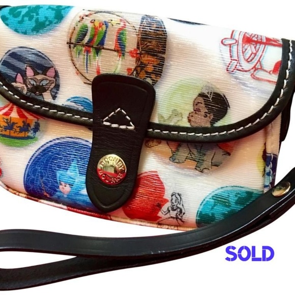 Dooney & Bourke Handbags - SOLD! DOONEY & BOURKE Disneyworld Buttons Wristlet
